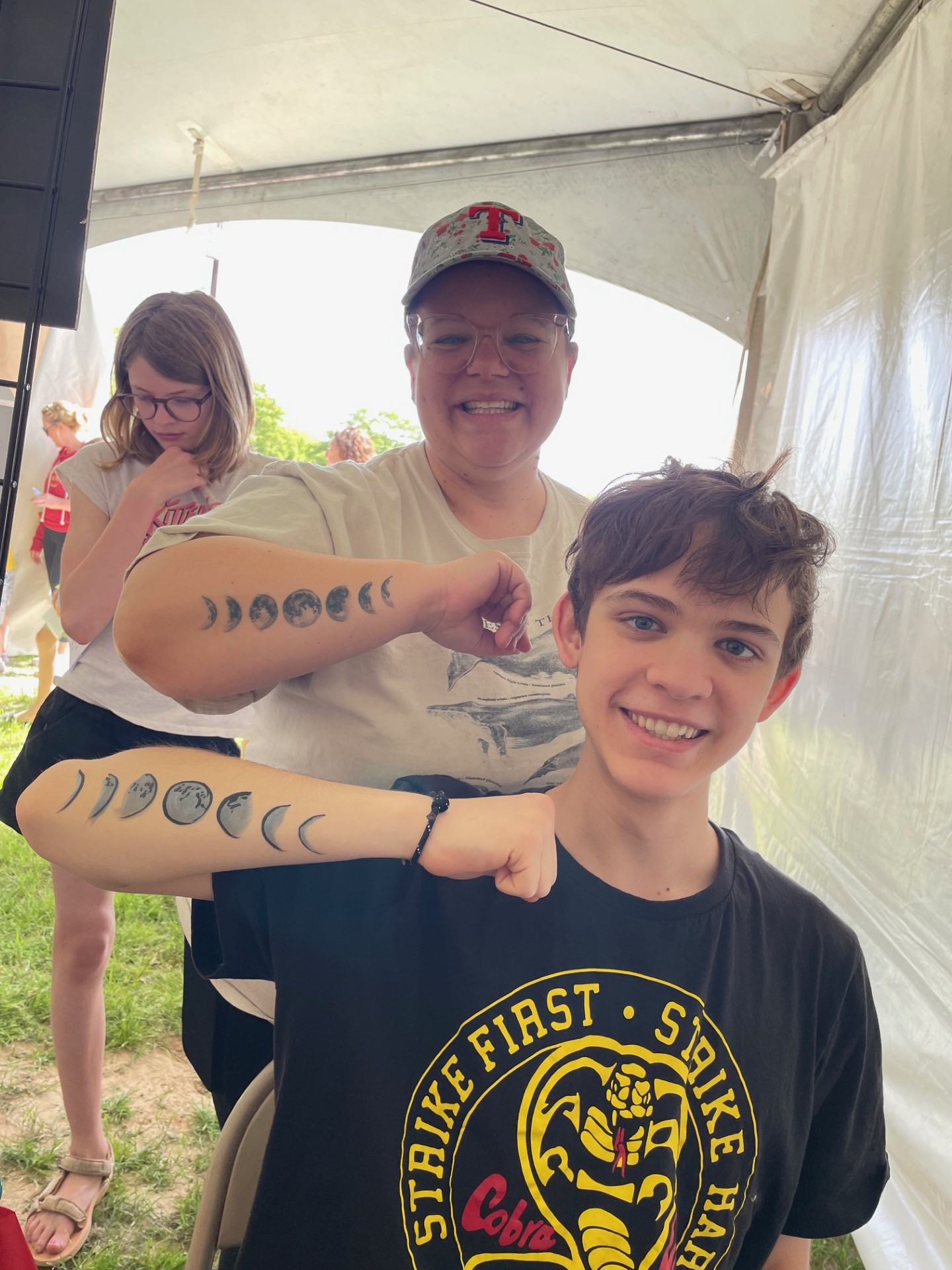 eclipse face paint on arm